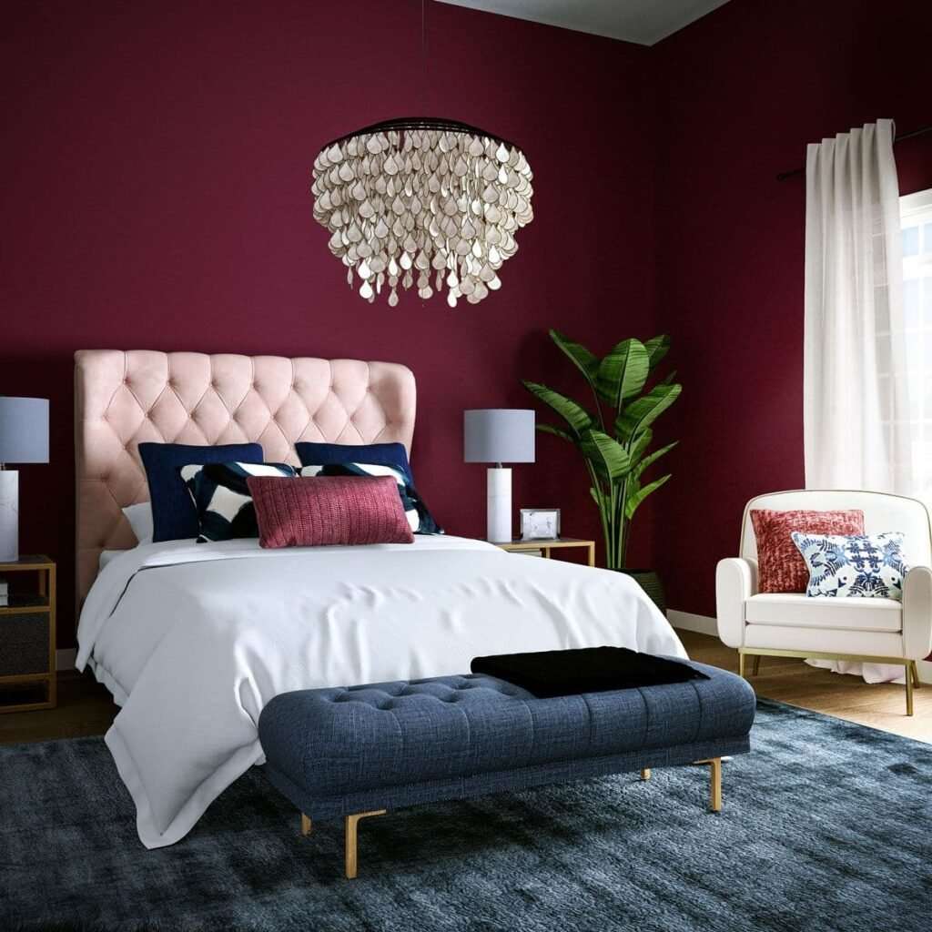 Deep Berry Walls Pair With A Blush Tufted Headboard