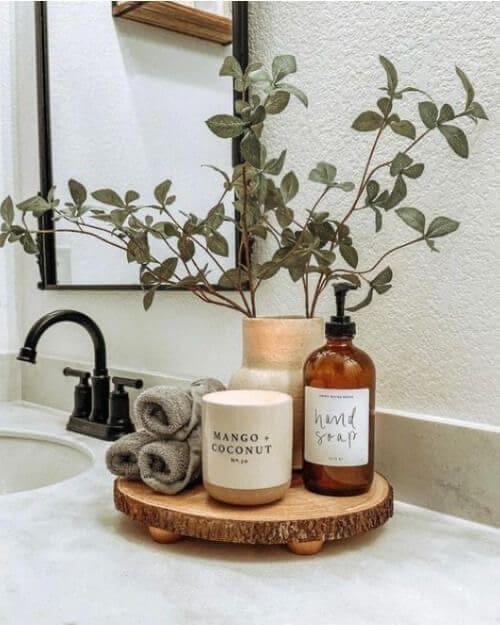 Wood Slice Riser Elevates Candle and Soap Dispenser