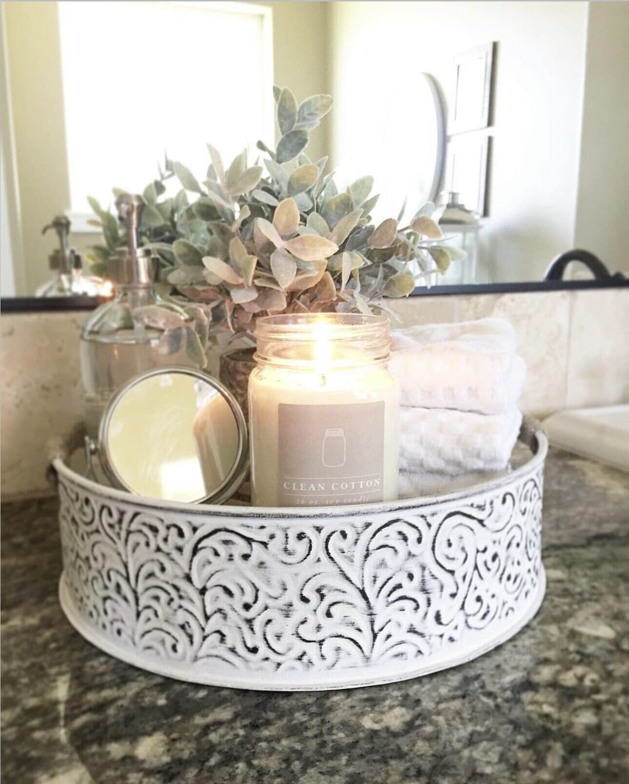 Ornate White Tray Groups Greenery, Candle, and Rolled Towels