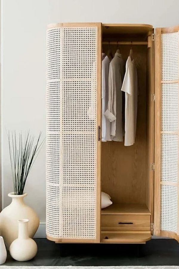 Boho space featuring a crafted cane wardrobe for boho furniture ideas.