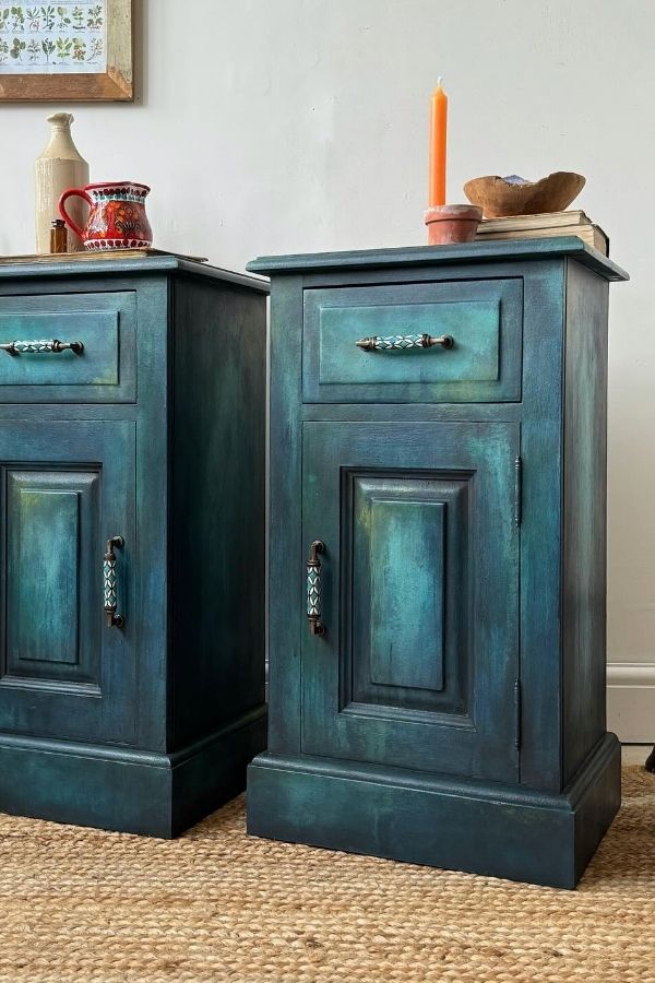 Teal cabinets with boho artisanal handles, inspiring boho furniture ideas.