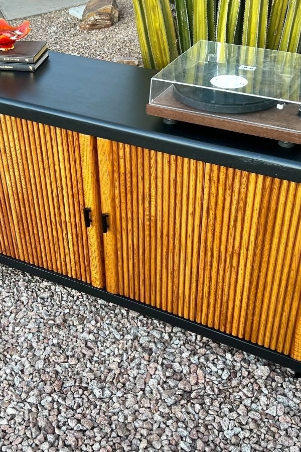 Boho credenza complements retro record player; enhances boho furniture ideas.