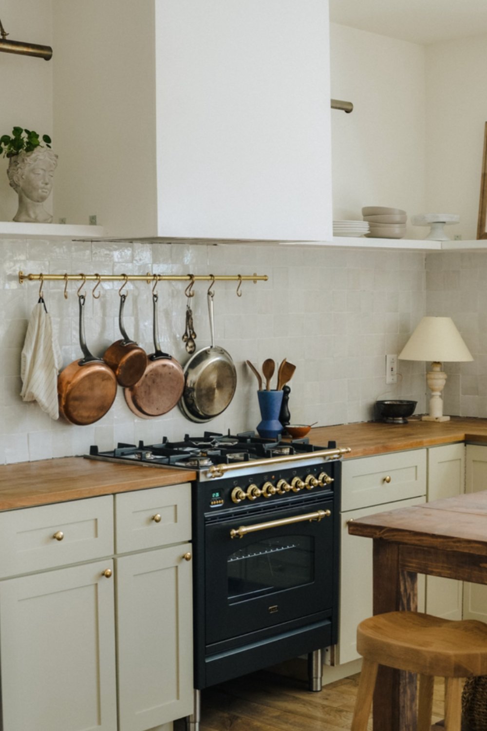 Brass Pot Rail Adds Warmth Above the Range