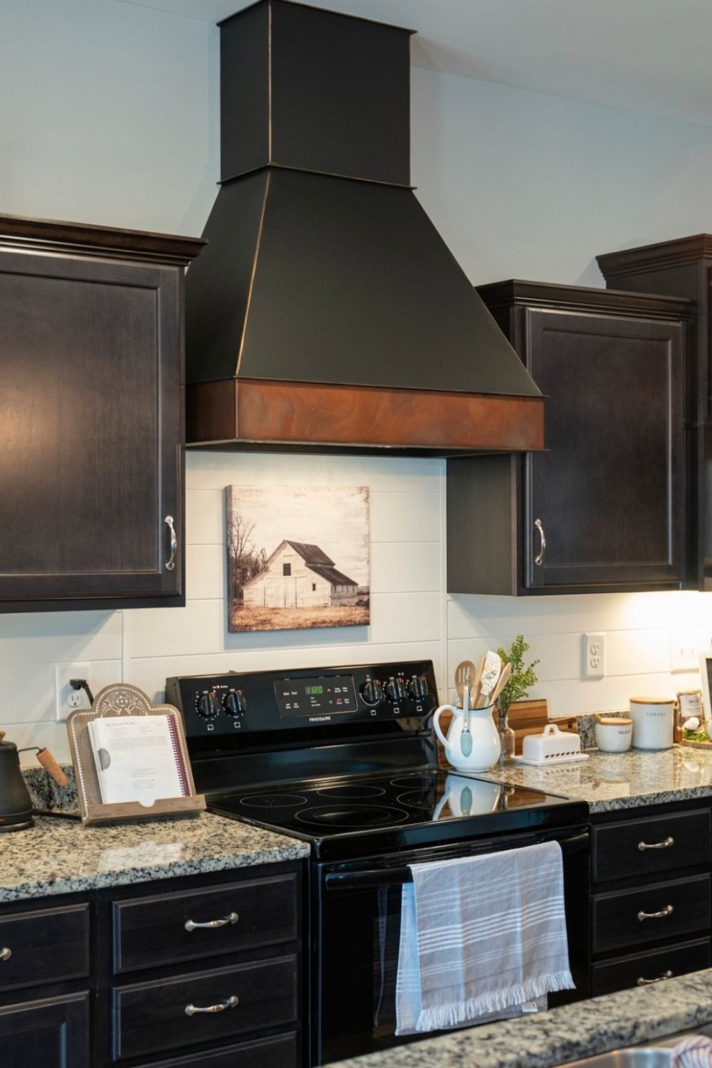 Black Range Hood With Rustic Barn Art Accent
