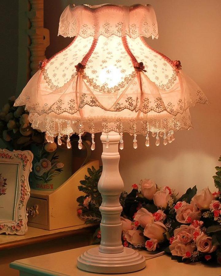 Vintage lace lampshade with beaded trim from The Other Aesthetic. Creates romantic lighting atmosphere.