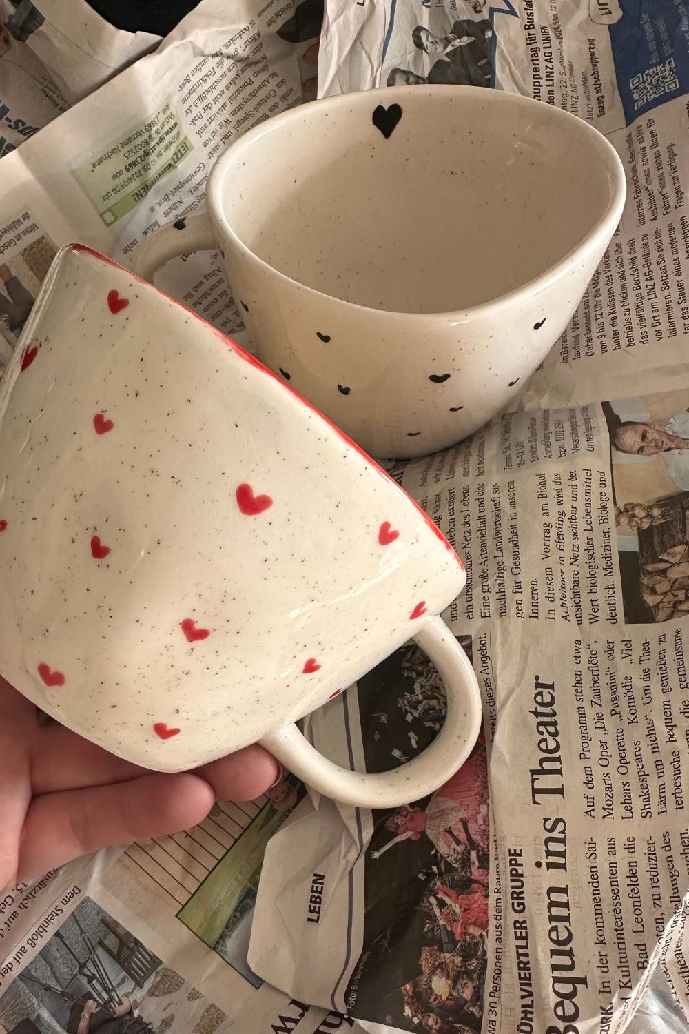 Hand-Painted Heart Mugs for a Cozy Kitchen Display