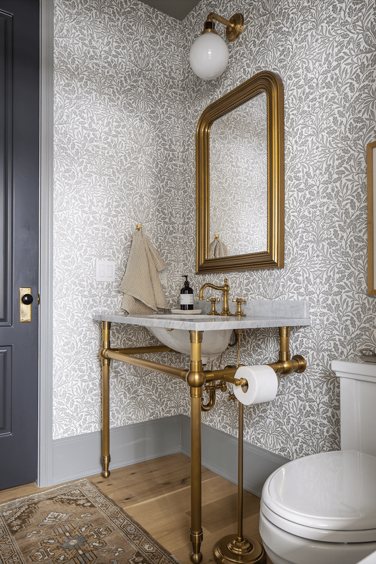 Brass Toilet Paper Stand Adds Functional Flair