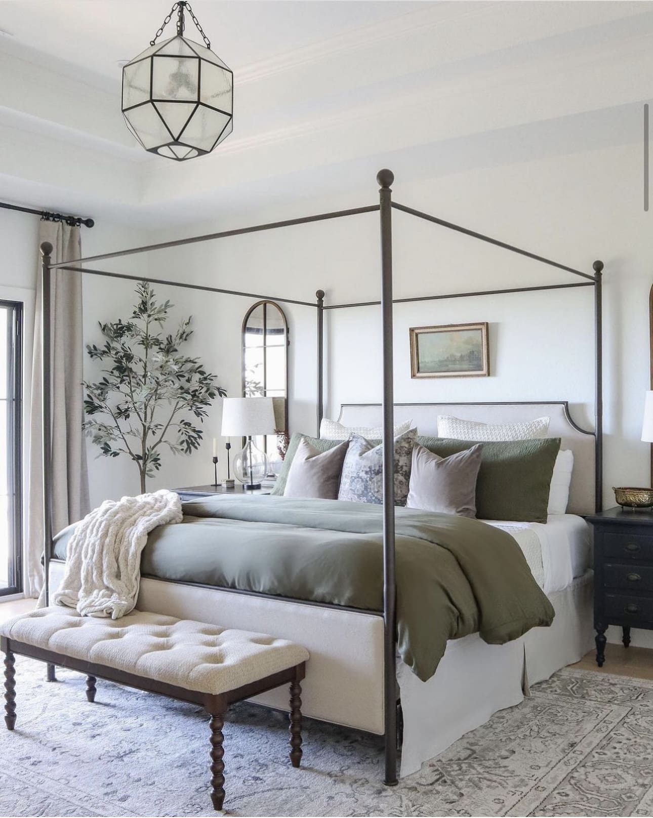 Anchor Your Bed with a Dark Metal Four-Poster