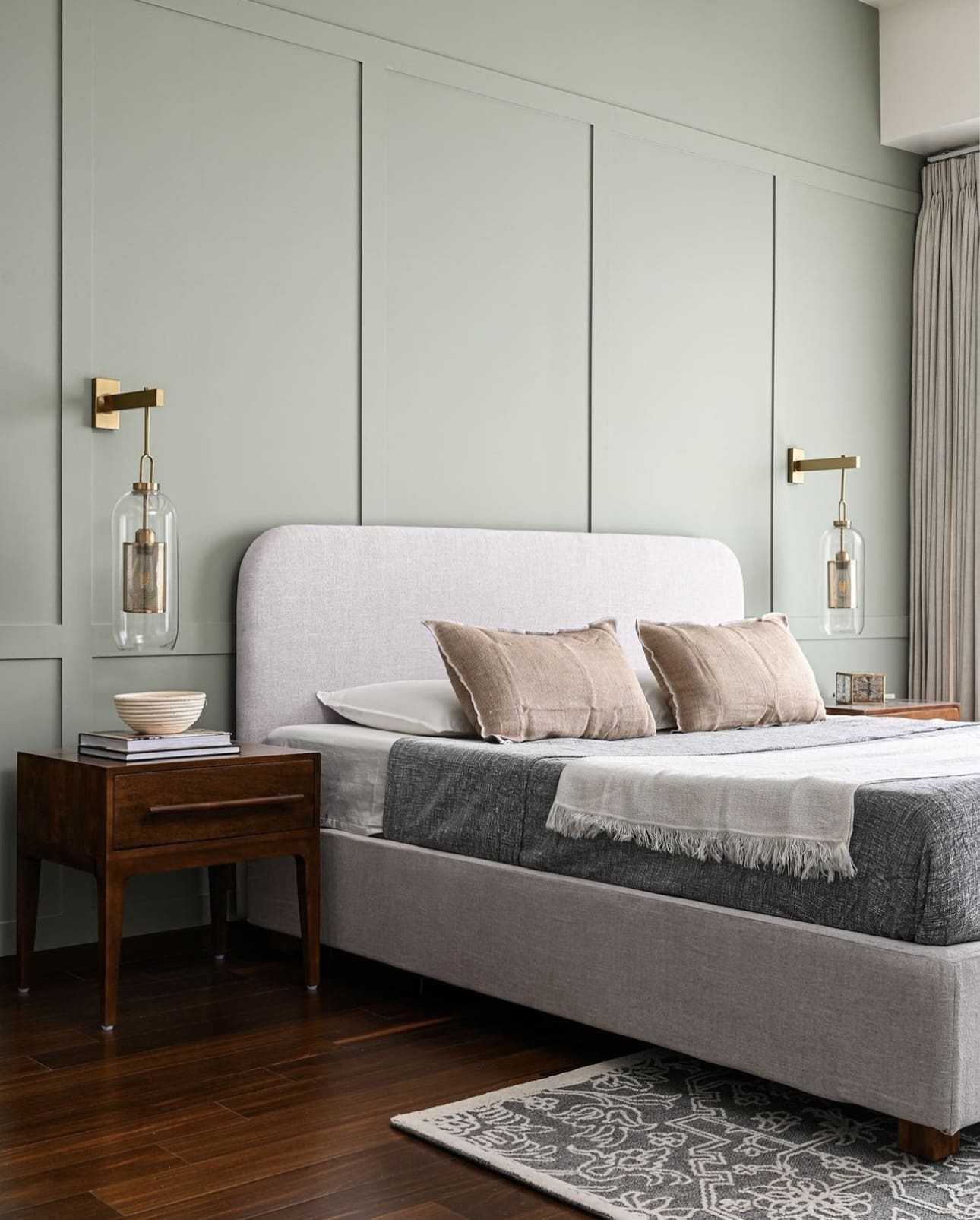 Brass Wall Sconces With Glass Cylinders Add Warm Lighting
