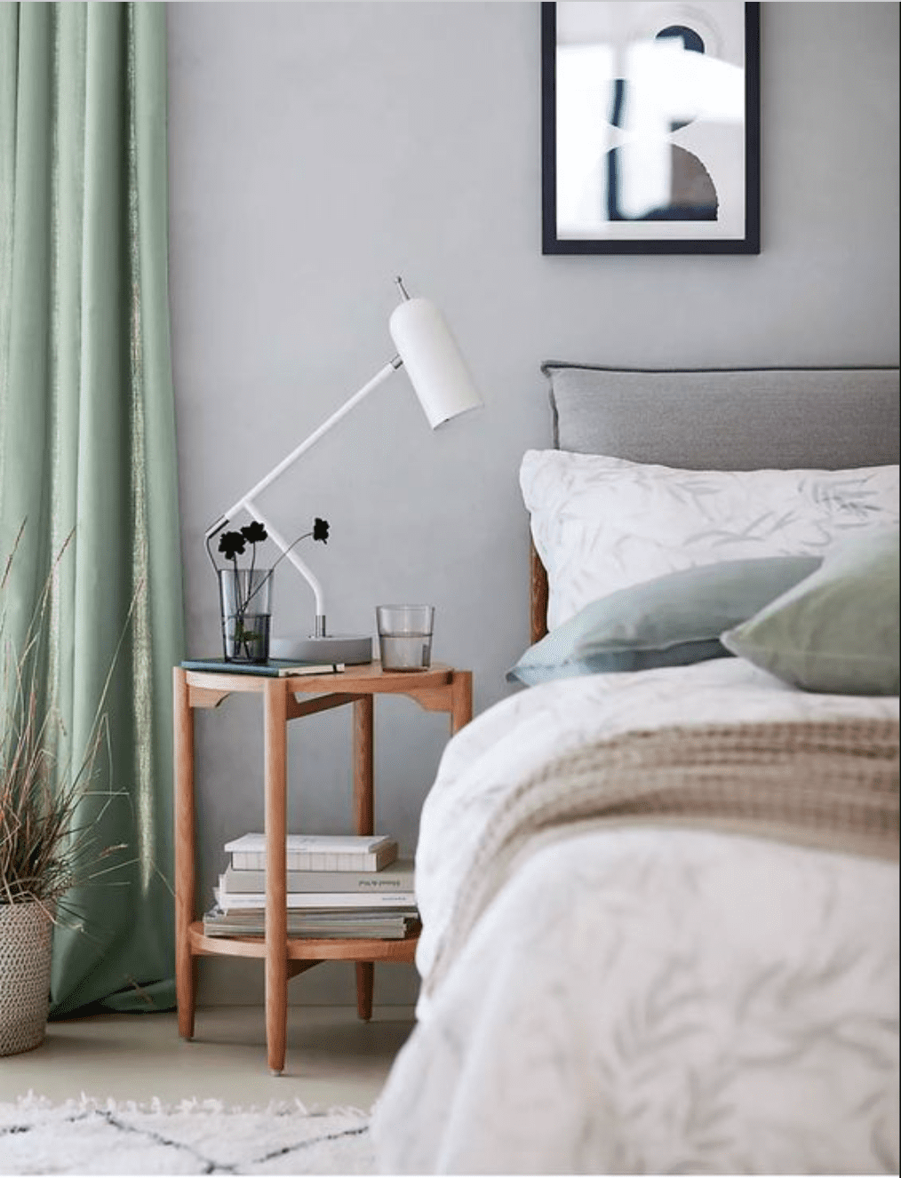 Ground Cool Tones with a Warm Wooden Bedside Table