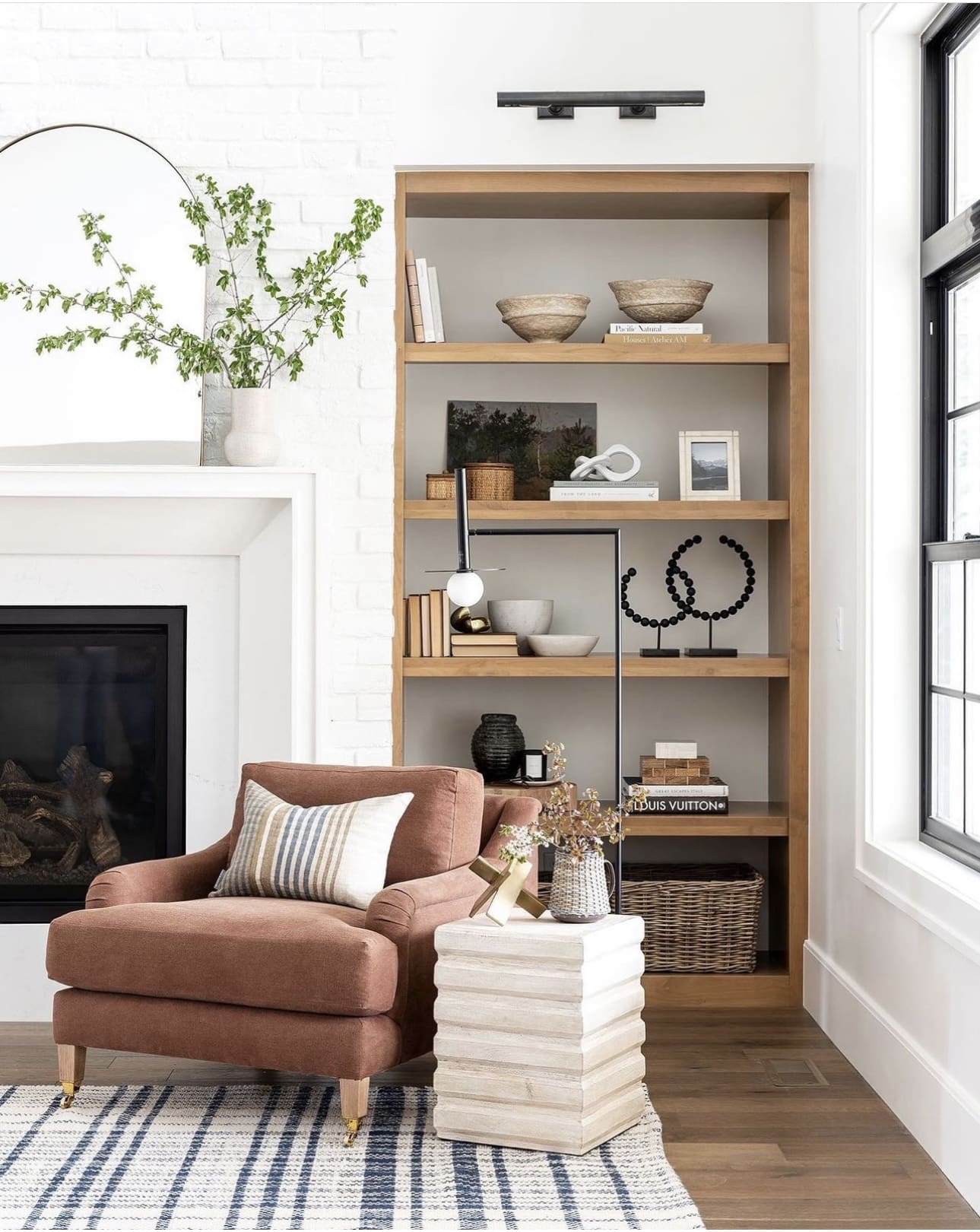 Layered wood side table adds textured height