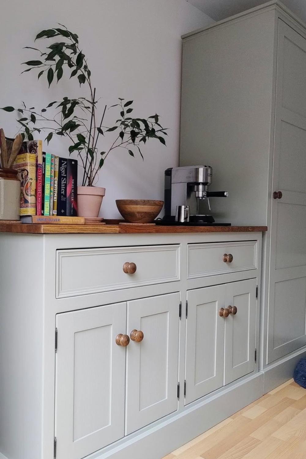 Opt for Wood Knobs on Pale Gray Cabinets