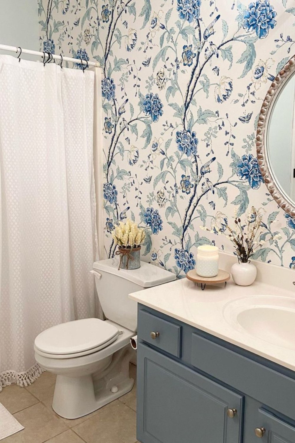 Bold Floral Wallpaper Adds Pattern to a Farmhouse Bathroom