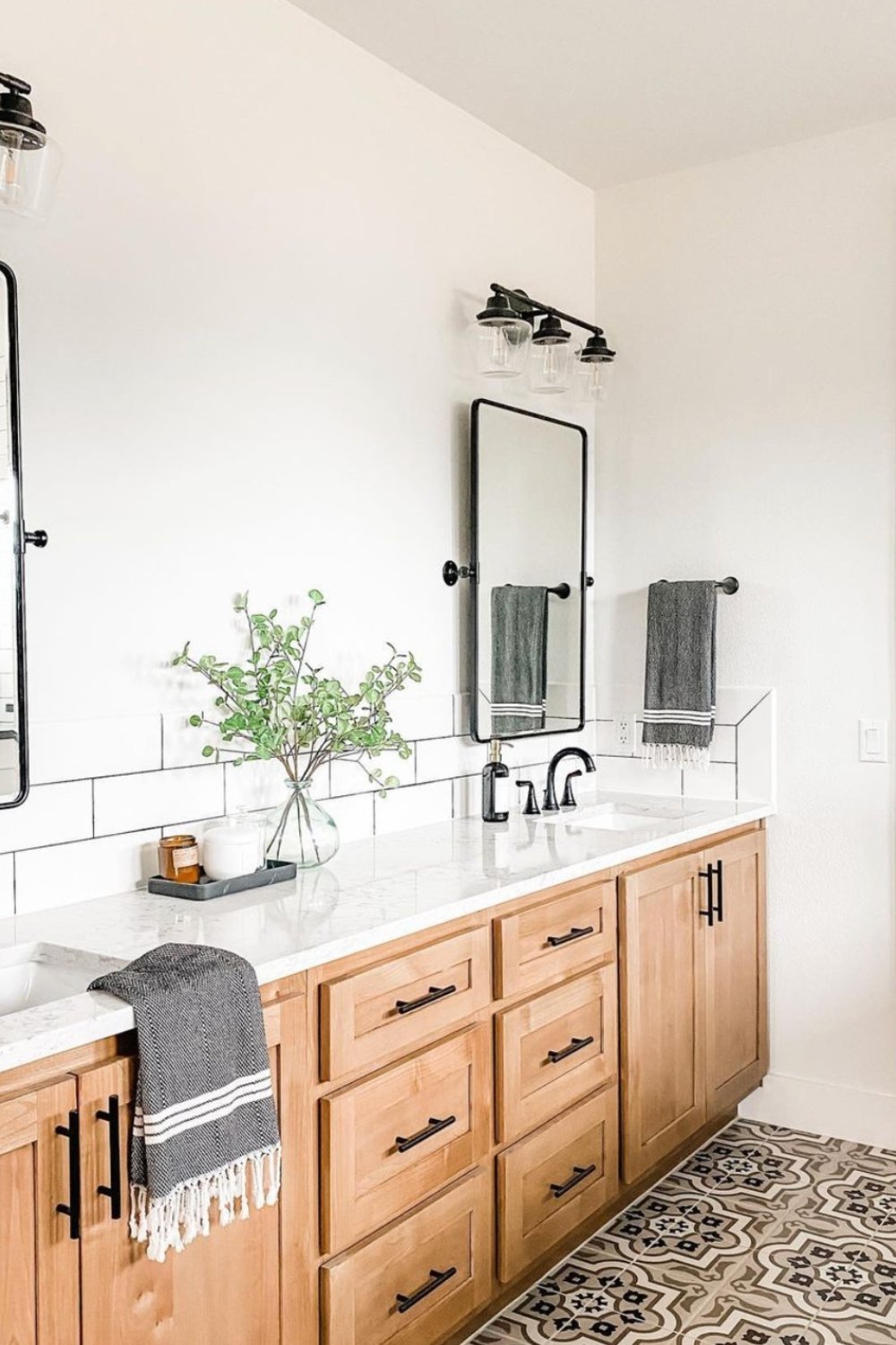 Select a wooden vanity with black hardware for natural warmth