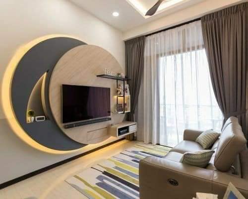 Layered Circular Design Frames TV With Ambient Backlighting