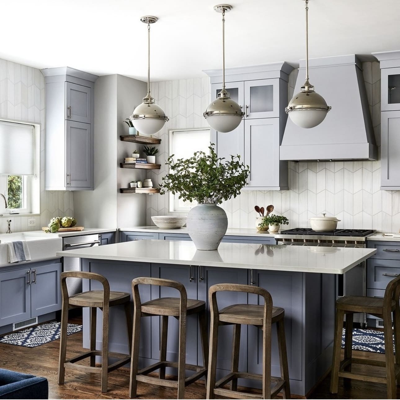 Open Display: Floating Shelves on Blue Corner Cabinetry