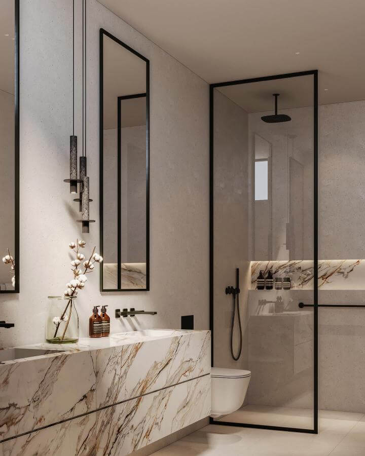 White and brown veined marble vanity in modern bathroom with black accents from @ninamagonstudio natural stone bathroom ideas sleek and sophisticated design