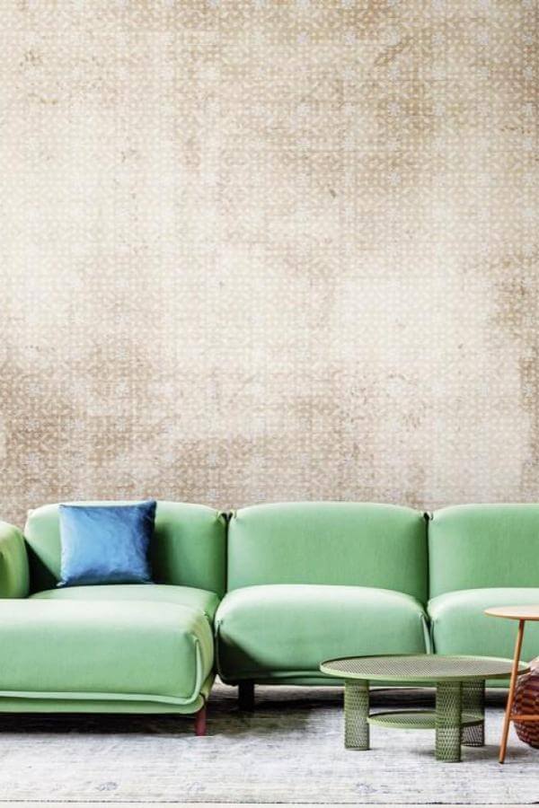 Subtle textured wallpaper enhances modern living room with elegant design.